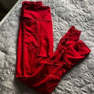 Pink, Red leggings with mesh criss cross at bottom, Size S